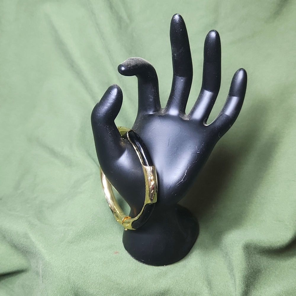 Womens black and gold clasp bracelet